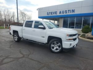 PRE-OWNED 2018 CHEVROLET SILVERADO 1500 LT FOUR WHEEL DRIVE CREW CAB $25,998